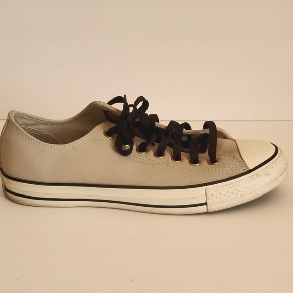 Converse gray leather shoes.
